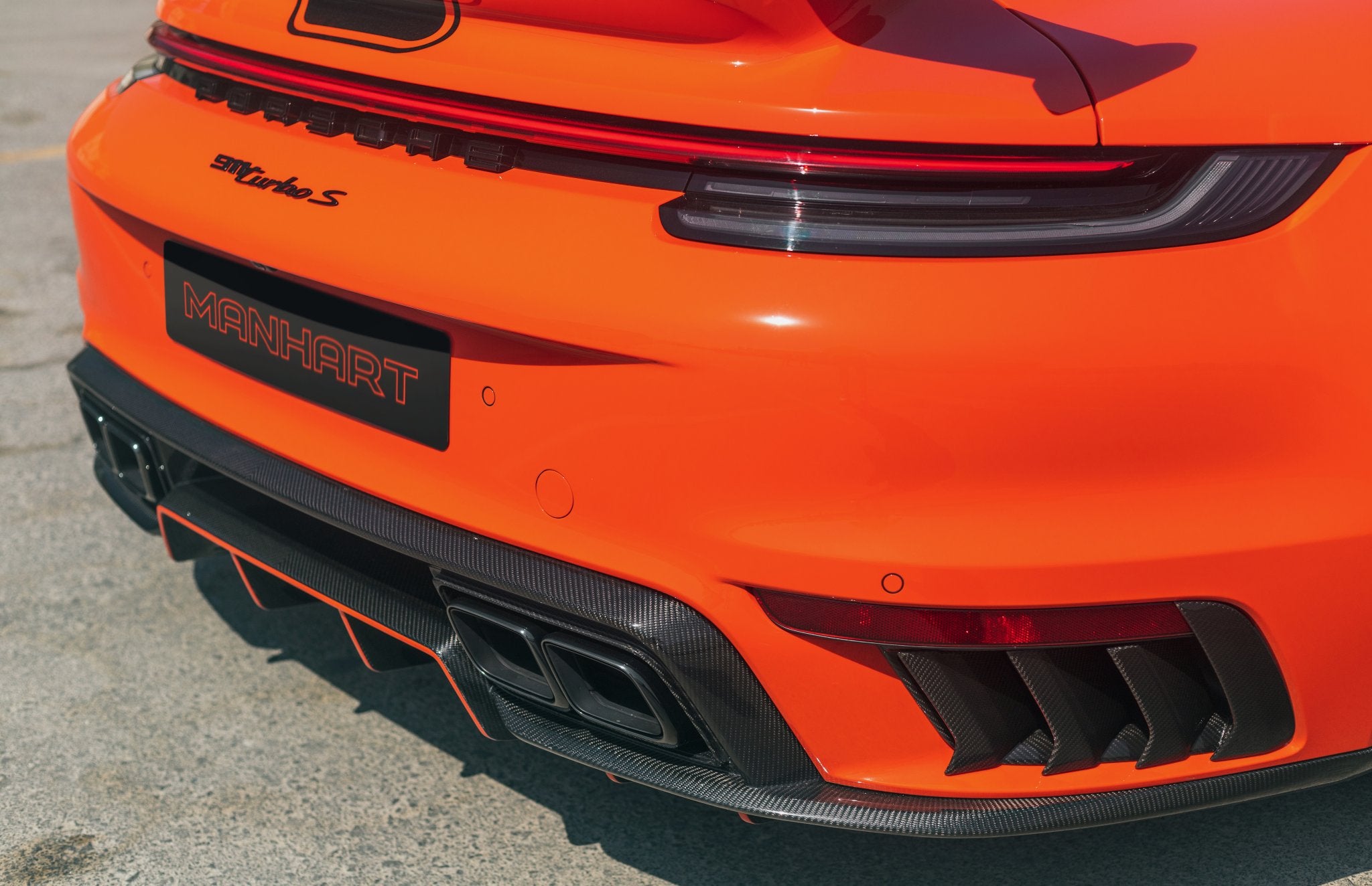 MANHART TR 800 TURBO S CBON OUTFIT AND 833 HP FOR THE ALL-WHEEL-DRIVE TOP MODEL OF THE PORSCHE 992